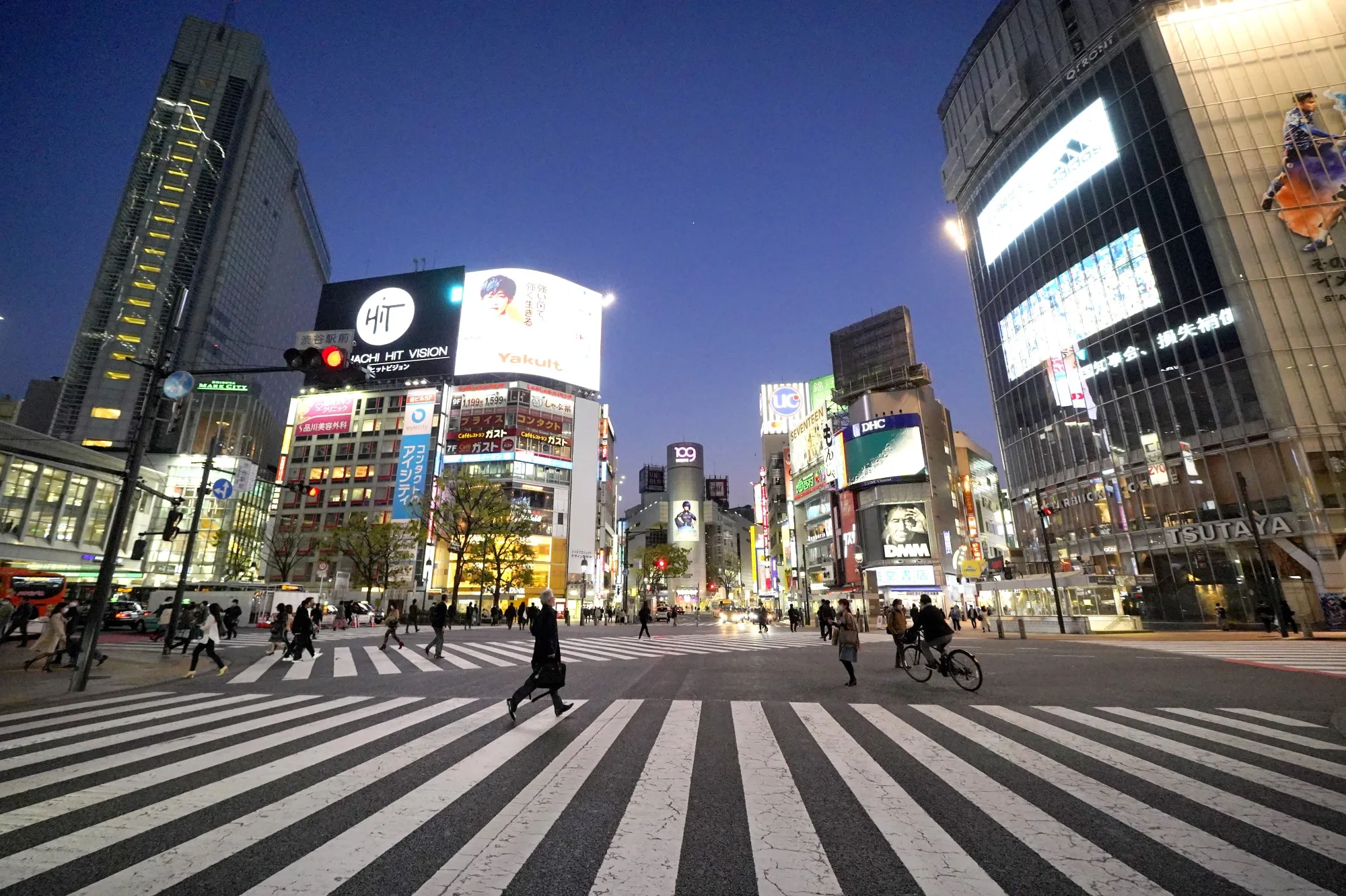 Few people cross the usually packed intersection in Shibuya, Tokyo, April 8.