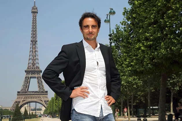 Falciani posing in July on the Champs de Mars in Paris