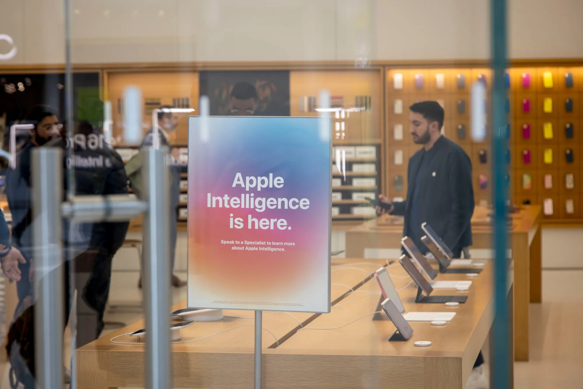 Apple Intelligence signage at an Apple store in New York.