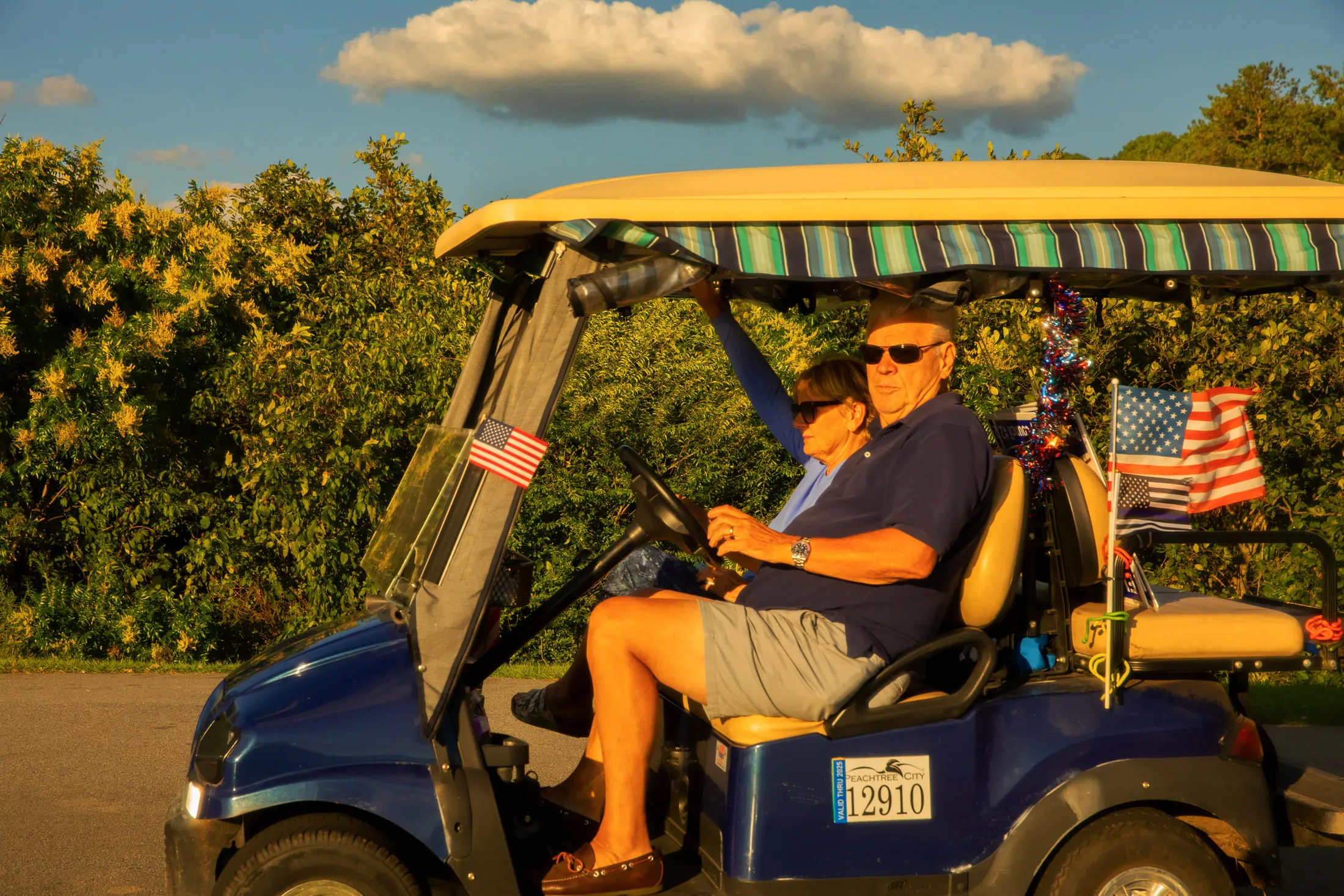 Golf cart riders enjoying the sun in Peachtree City.