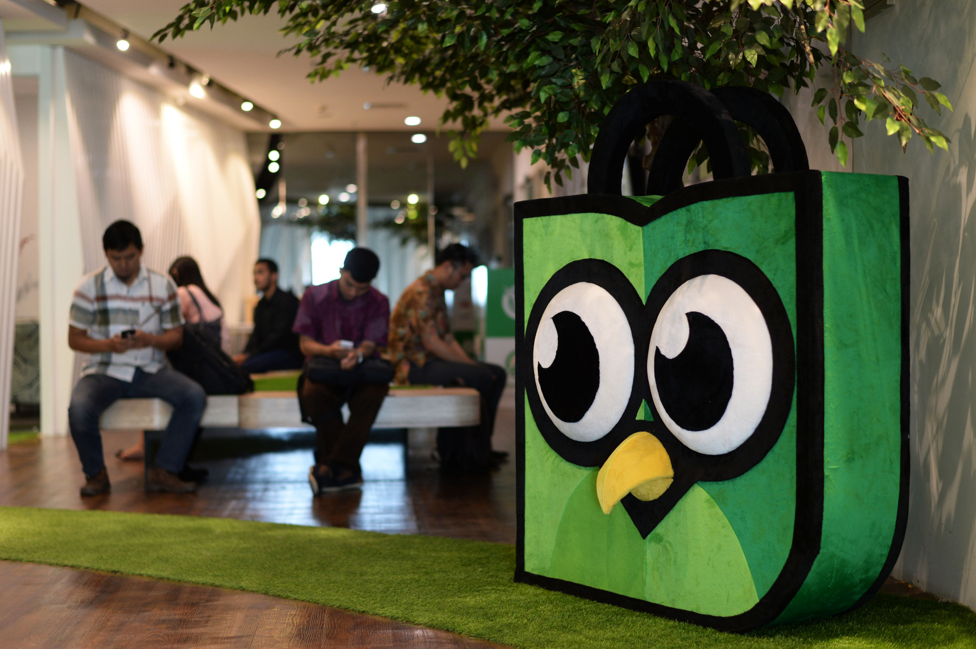 PT Tokopedia's mascot Toped sits on display in the reception area at the company's offices in Jakarta, Indonesia.&nbsp;