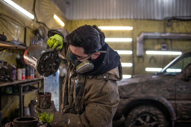 Sabir Mamedov, a graffiti artist before the war, and his friend Alik Mukhin, who tuned cars for racing, have spray painted camouflage onto thousands of rifles, mortar tubs and vehicles. 