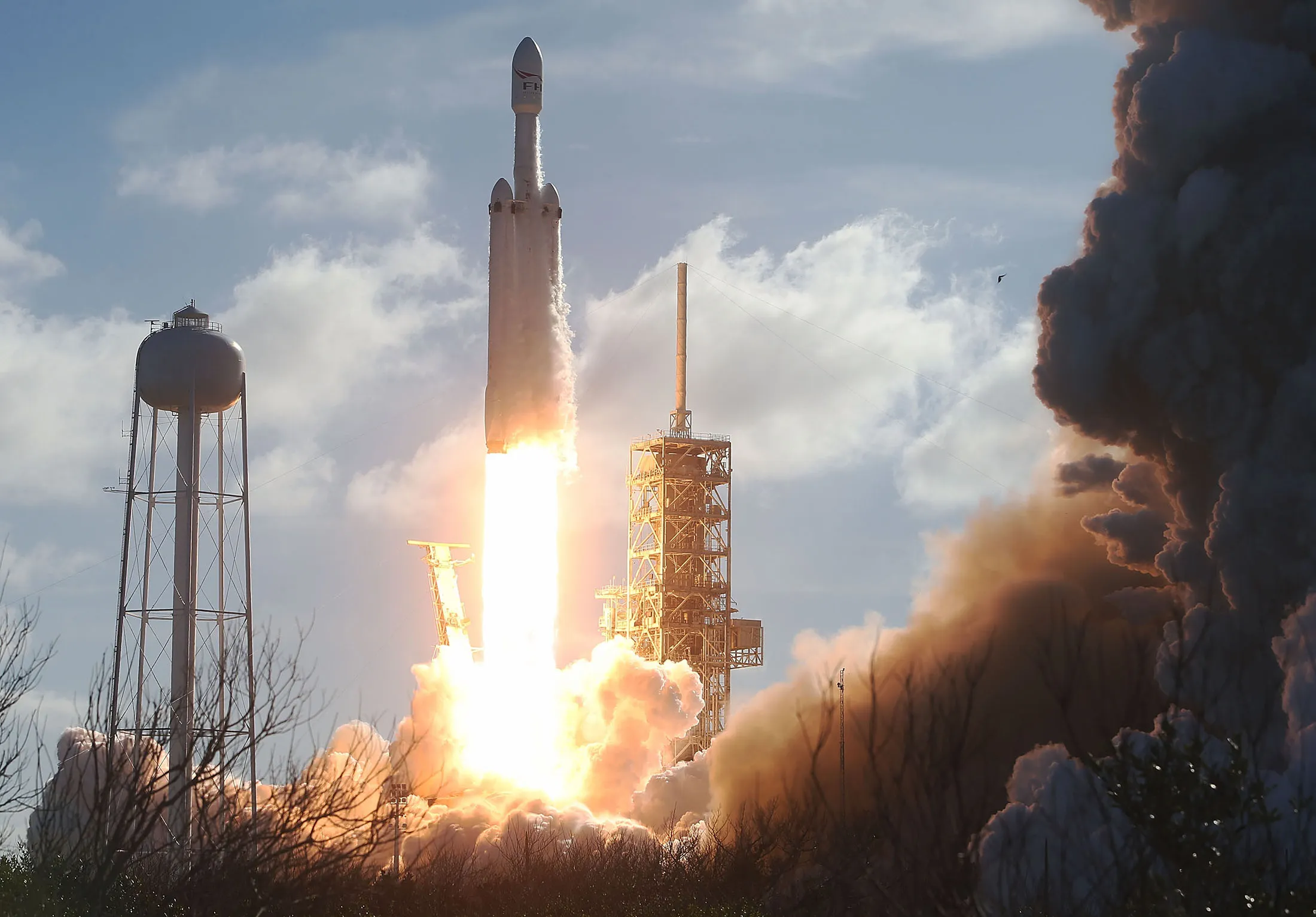 The SpaceX Falcon Heavy rocket lifts off from launch pad 39A at Kennedy Space Center in Cape Canaveral, Florida in 2018.
