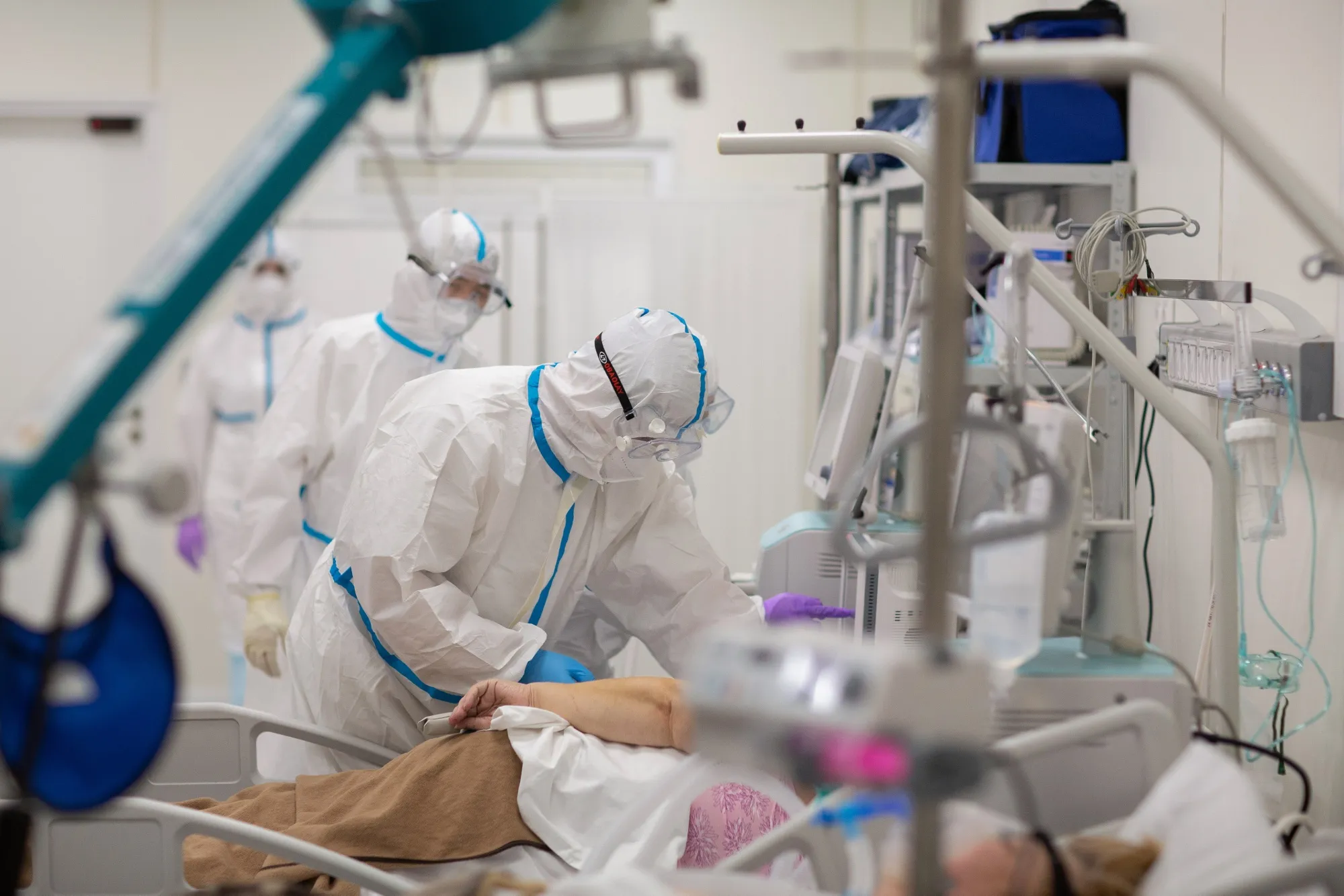 Medical workers treat a patient inside a temporary Covid-19 hospital at the Krylatskoye Ice Palace in Moscow.