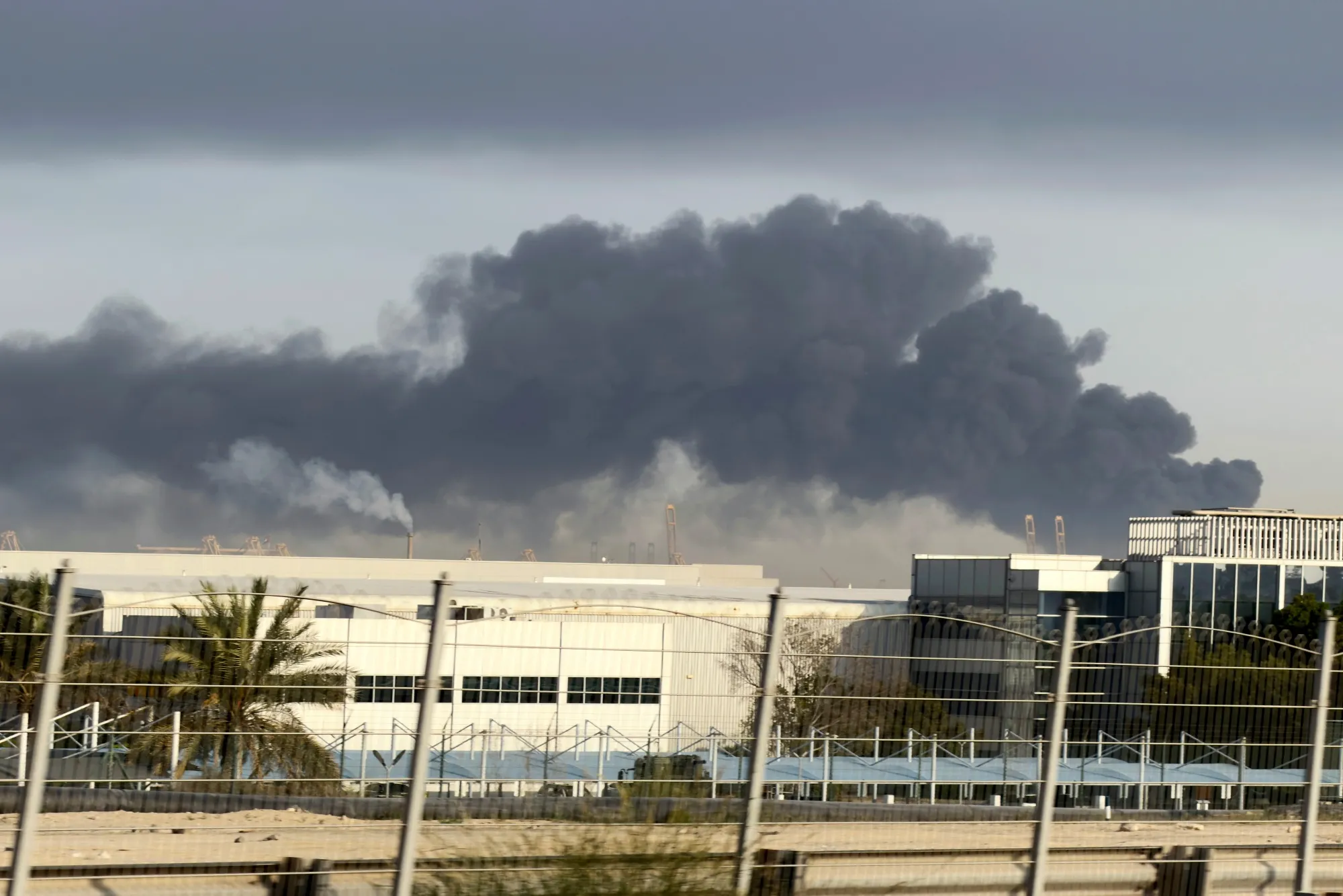 Smoke rises from Jebel Ali port after an Iranian missile attack in Dubai.