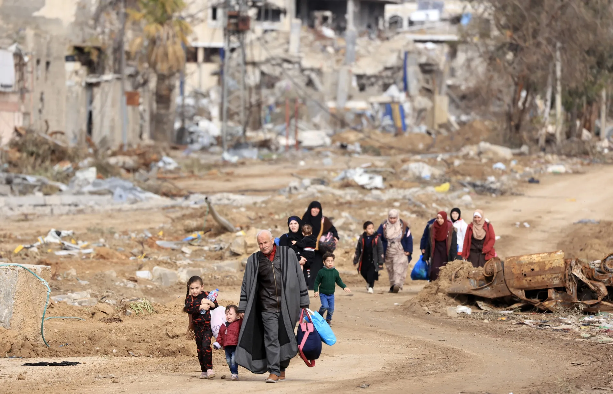 Palestinians flee the north on the southern outskirts of Gaza City in November.