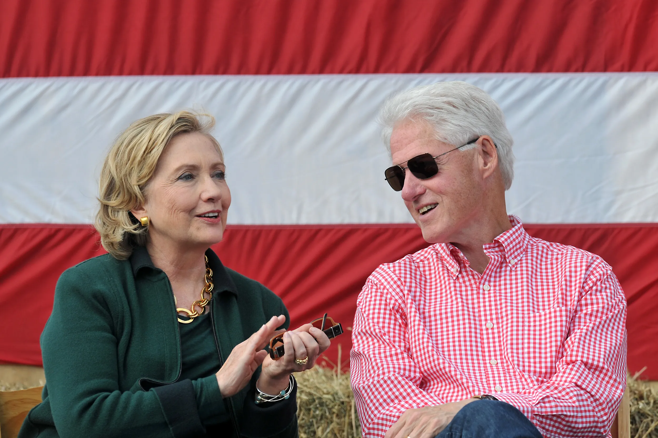 Former President Bill Clinton and his wife former Secretary of State Hillary Rodham Clinton attend the 37th Harkin Steak Fry, September 14, 2014 in Indianola, Iowa.
