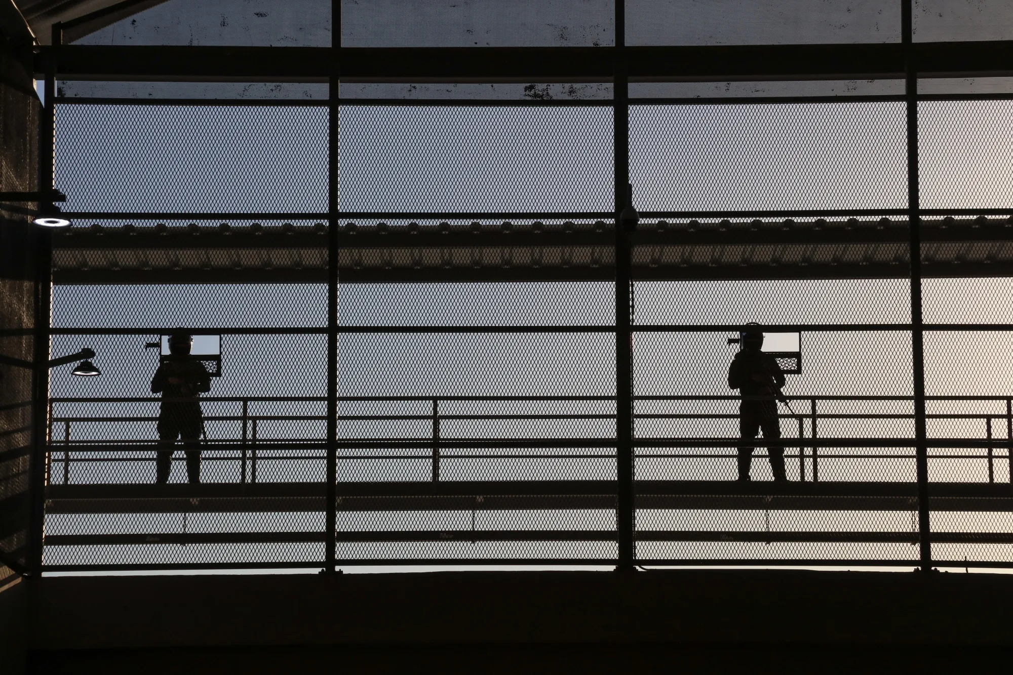 Prison officers stand guard at the maximum security penitentiary CECOT (Center for the Compulsory Housing of Terrorism) in Tecoluca, San Vicente, El Salvador.