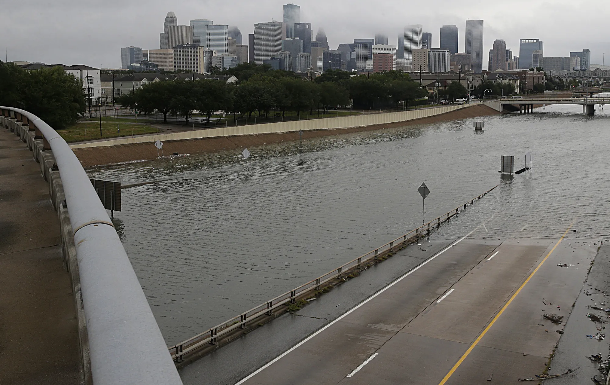 The downtown Houston skyline and flooded highway 288 on Aug. 27, 2017.
