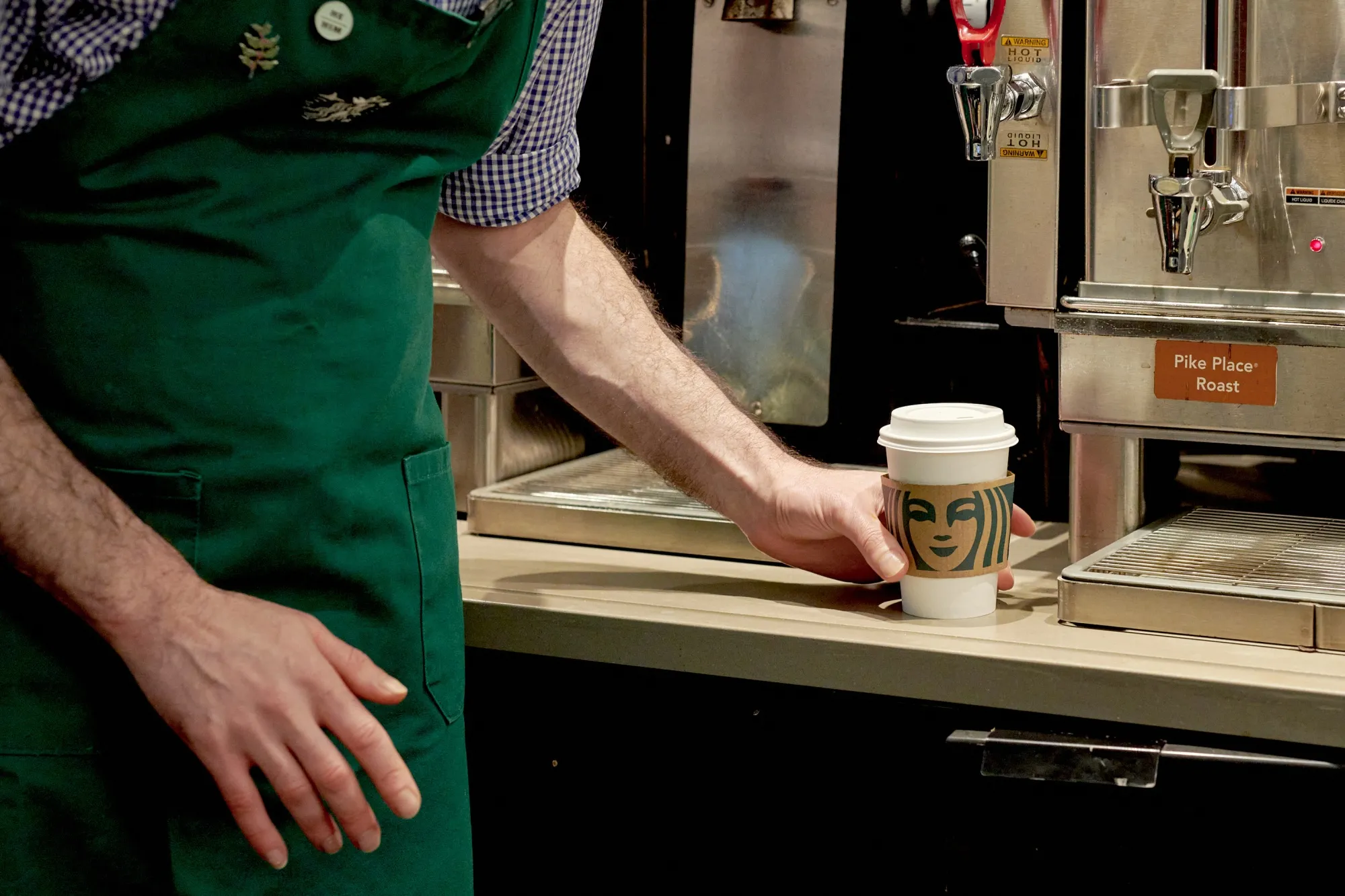 A barista makes a coffee at a Starbucks location in New York.