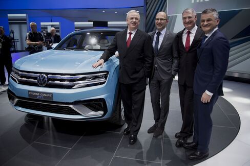 Volkswagen Chief Executive Officer Winterkorn (left) and Michael Horn, president and chief executive officer of Volkswagen Group of America (right), with two other VW executives at the the 2015 North American International Auto Show.