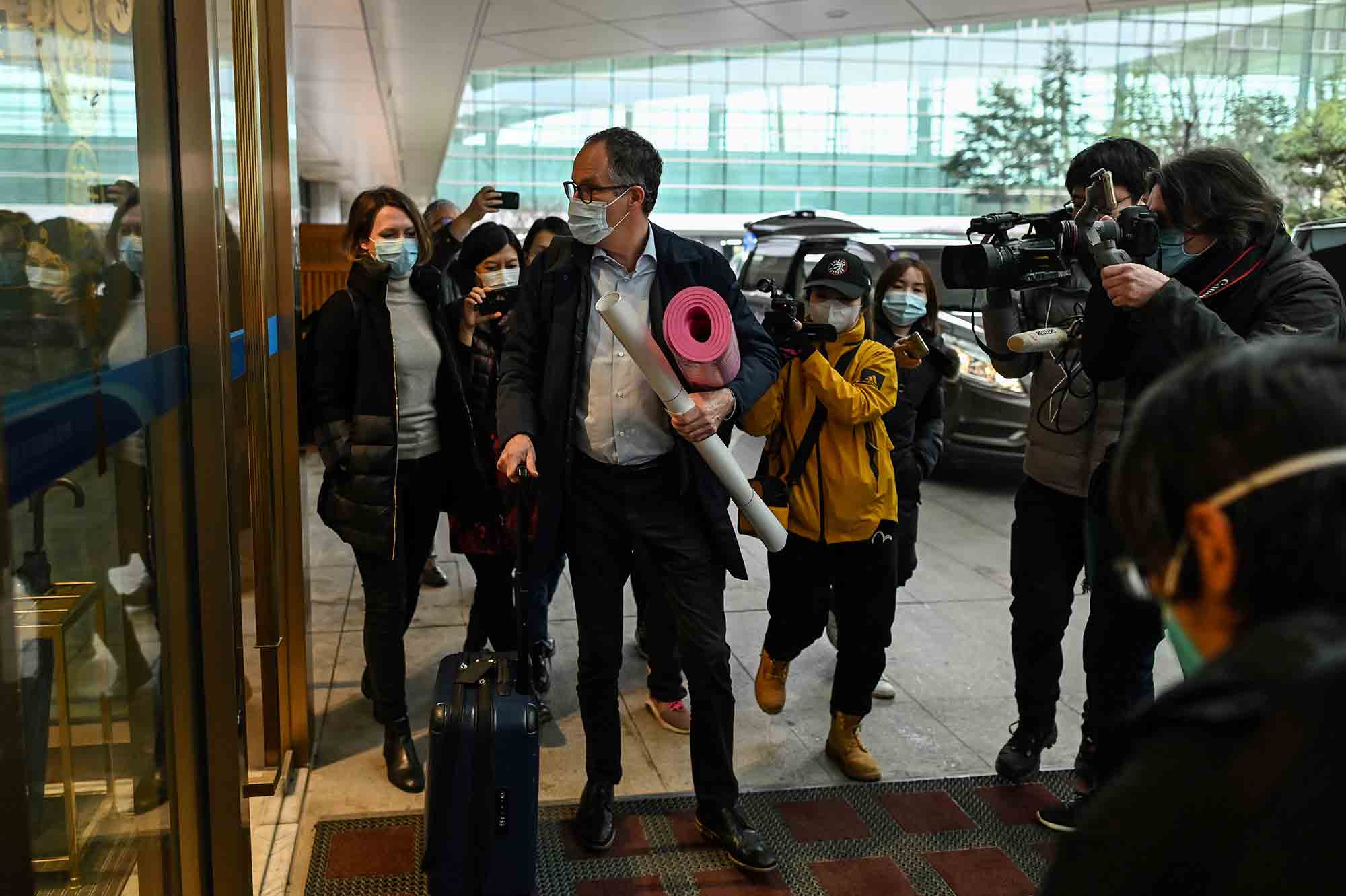WHO team members&nbsp;arrive at Tianhe International Airport as the depart Wuhan, China, on Feb. 10.