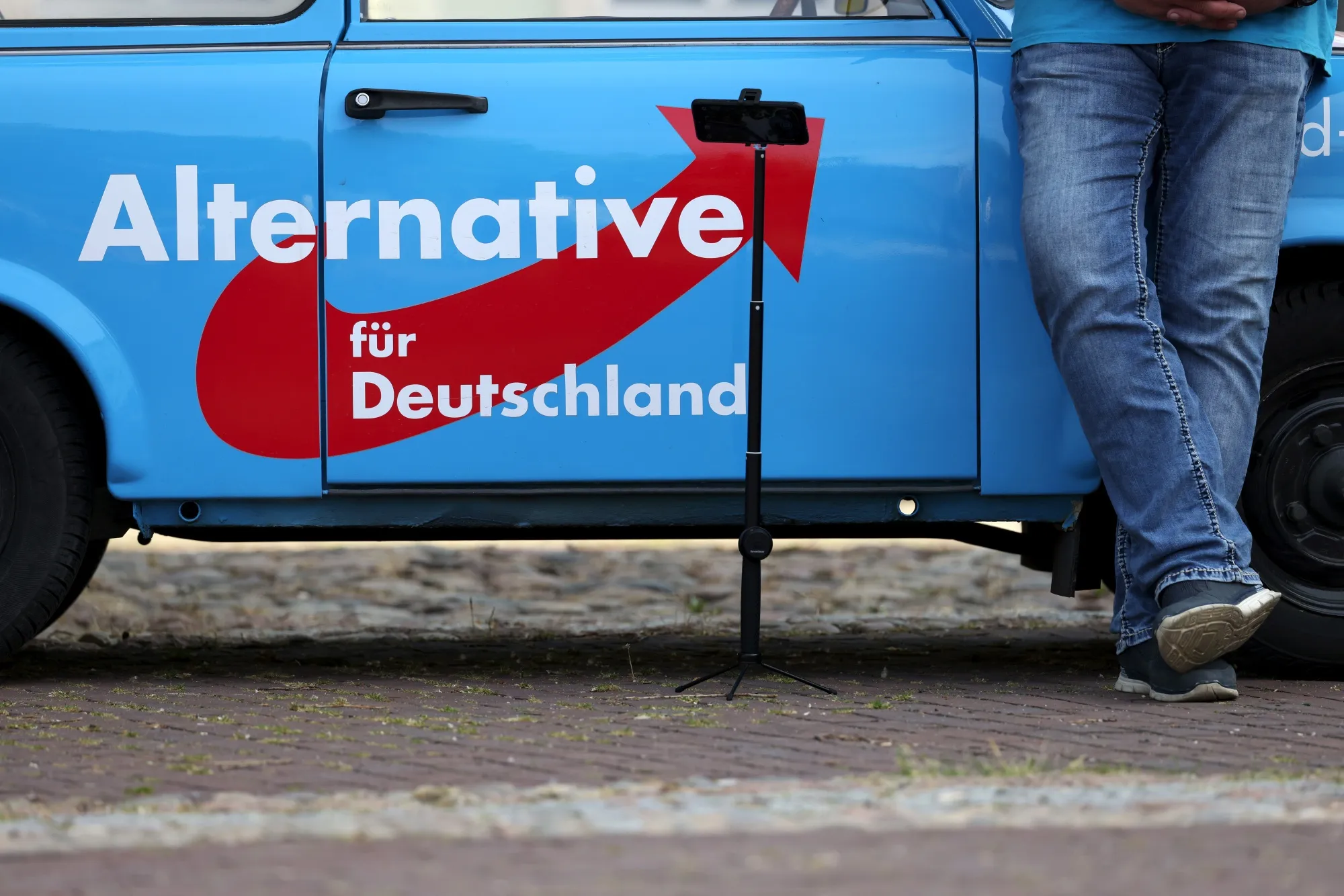 An Alternative for Germany (AfD) party logo on a Trabant automobile.