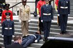 A guardsman faints before the service at St. Paul's Cathedral, on June 3.