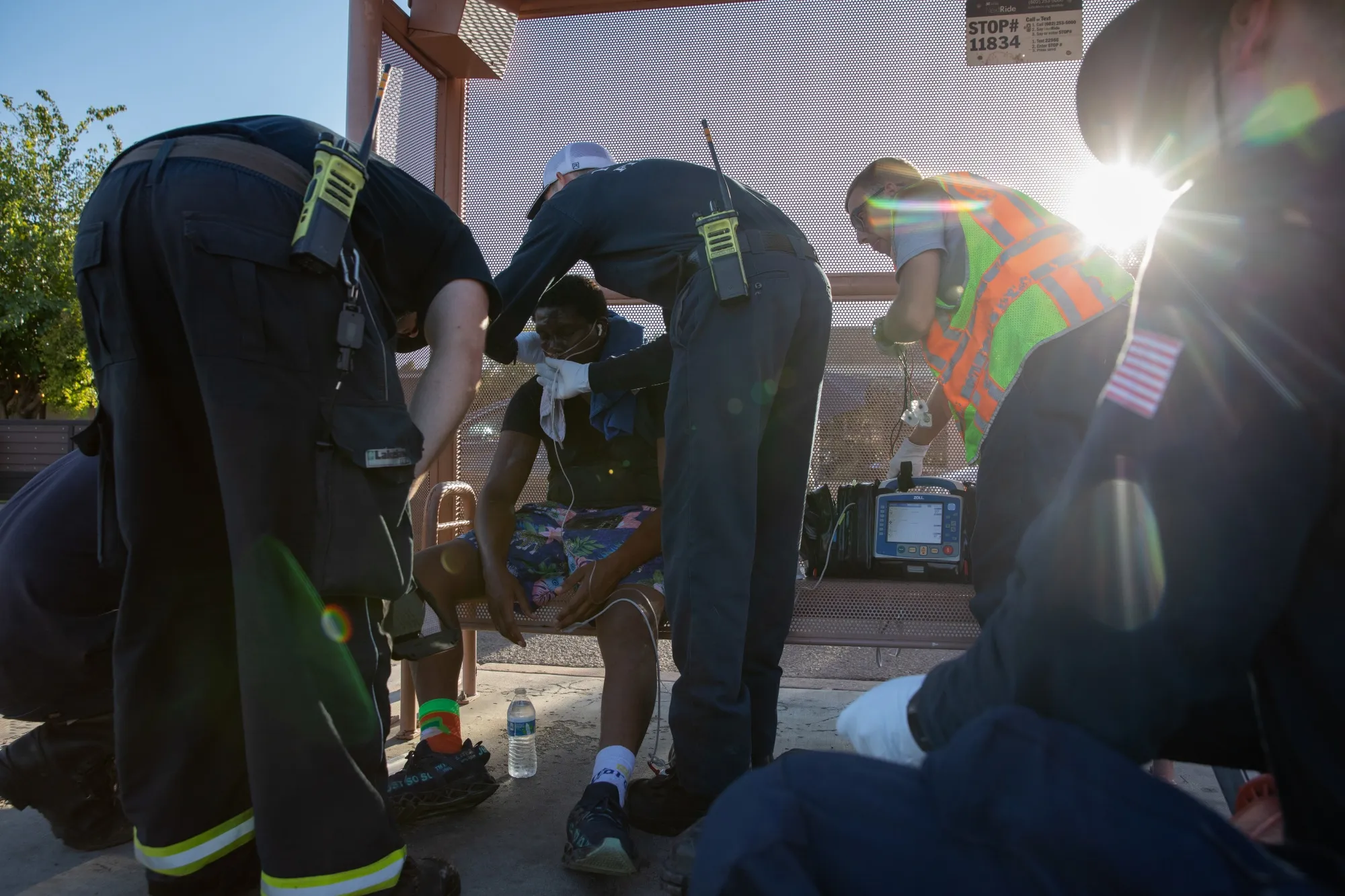 Phoenix firefighters treat a&nbsp;man having trouble breathing during a heat wave on July 20.&nbsp;