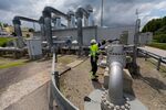 An employee adjusts a control valve at a gas storage facility&nbsp;in Muhldorf, Germany.&nbsp;