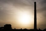 A smokestack of the shut coal-fired NTPC Ltd. Badarpur Thermal Power Station stands in Badarpur, India.