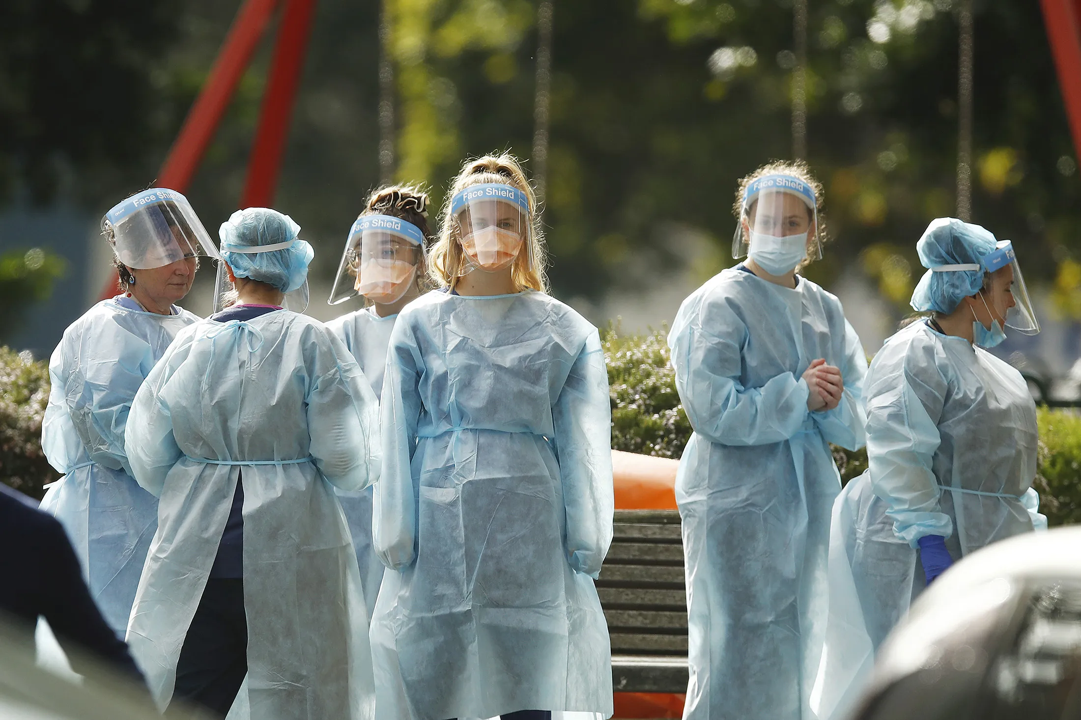 Workers in personal protective equipment are seen in Melbourne, Australia,&nbsp;on July 7.