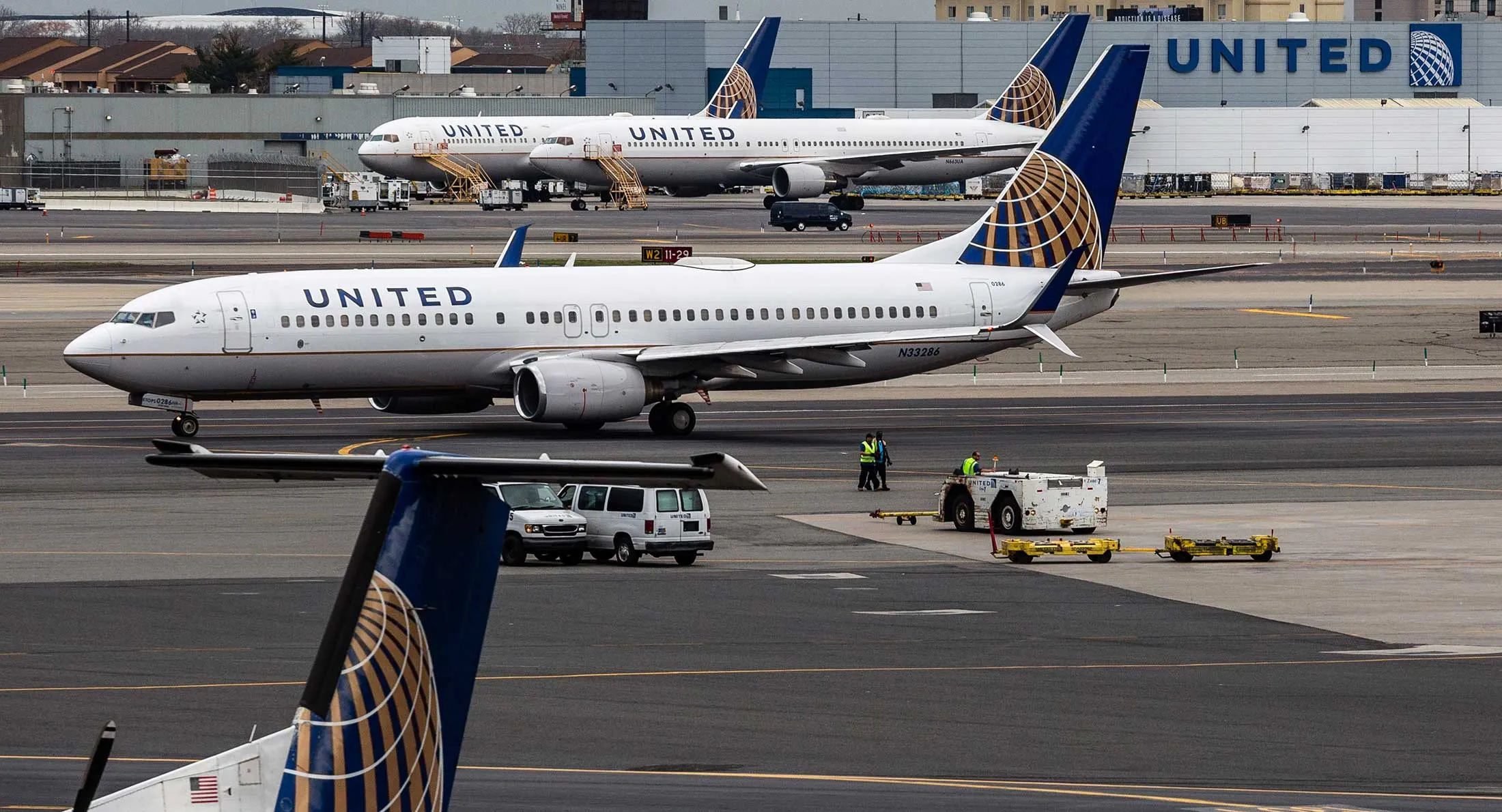 United Continental Holdings Inc. airplanes sit outside the company's hangar at Newark Liberty International Airport (EWR) in Newark, New Jersey, U.S., on Wednesday, April 12, 2017.
