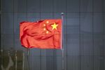 A Chinese flag in Beijing, China, on Friday, March 4, 2022. 