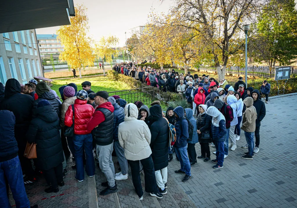 Residents wait in line to vote during Moldova's second round presidential election, on Nov.&nbsp;3.
