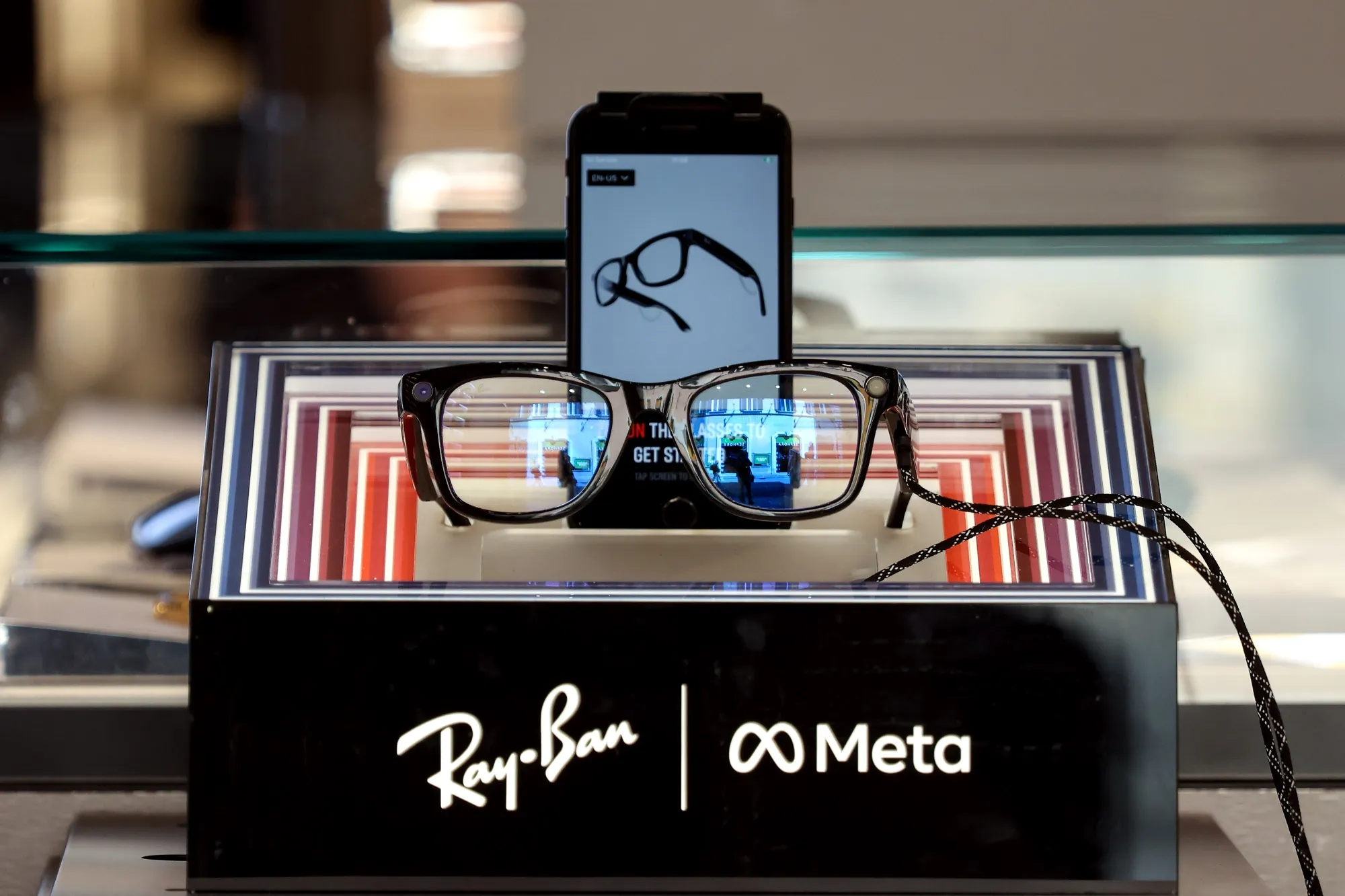 A pair of Ray-Ban Meta smart glasses in a Ray-Ban eyewear store in Rome.