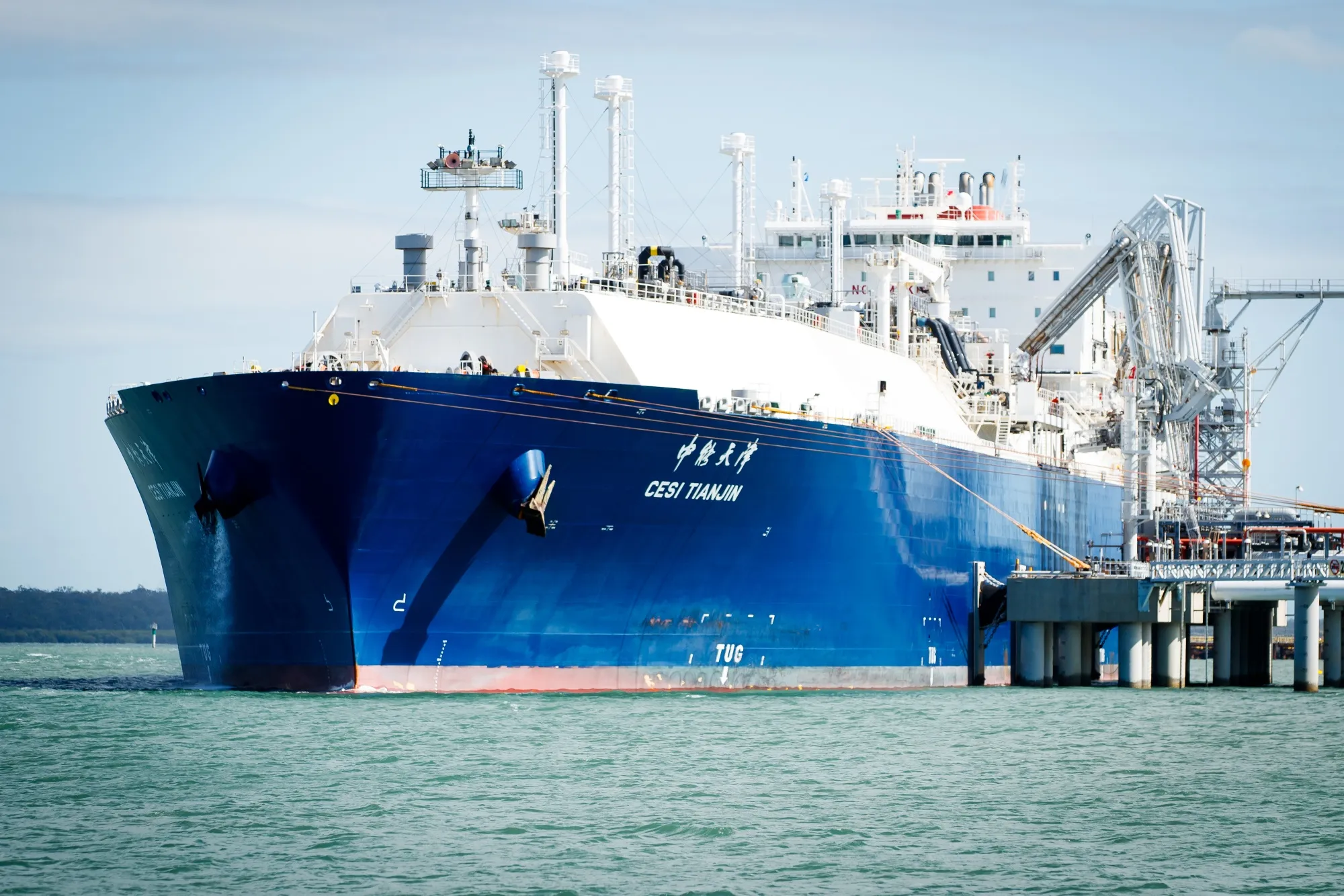 A liquefied natural gas tanker docked near a processing plant on Curtis Island, Australia.