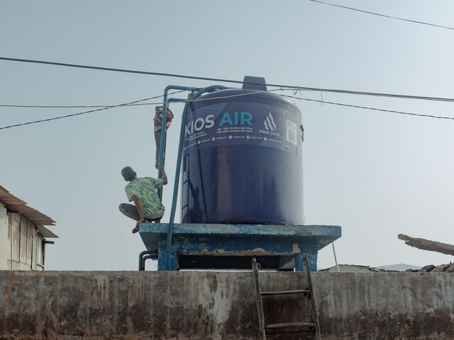 A PAM Jaya water tank. The utility sells clean water at a subsidized rate to households without piped water access. Photographer: Muhammad Fadli