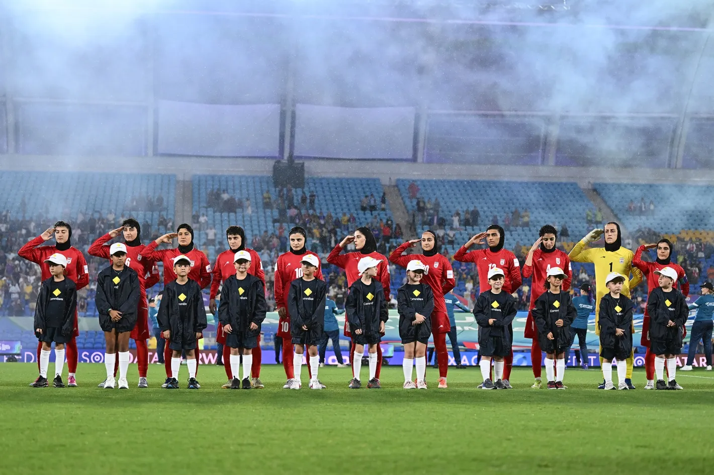 Islamic Republic of Iran players sing the national anthem during a match against&nbsp;Philippines at Gold Coast Stadium in Gold Coast, Australia on March 8.&nbsp;