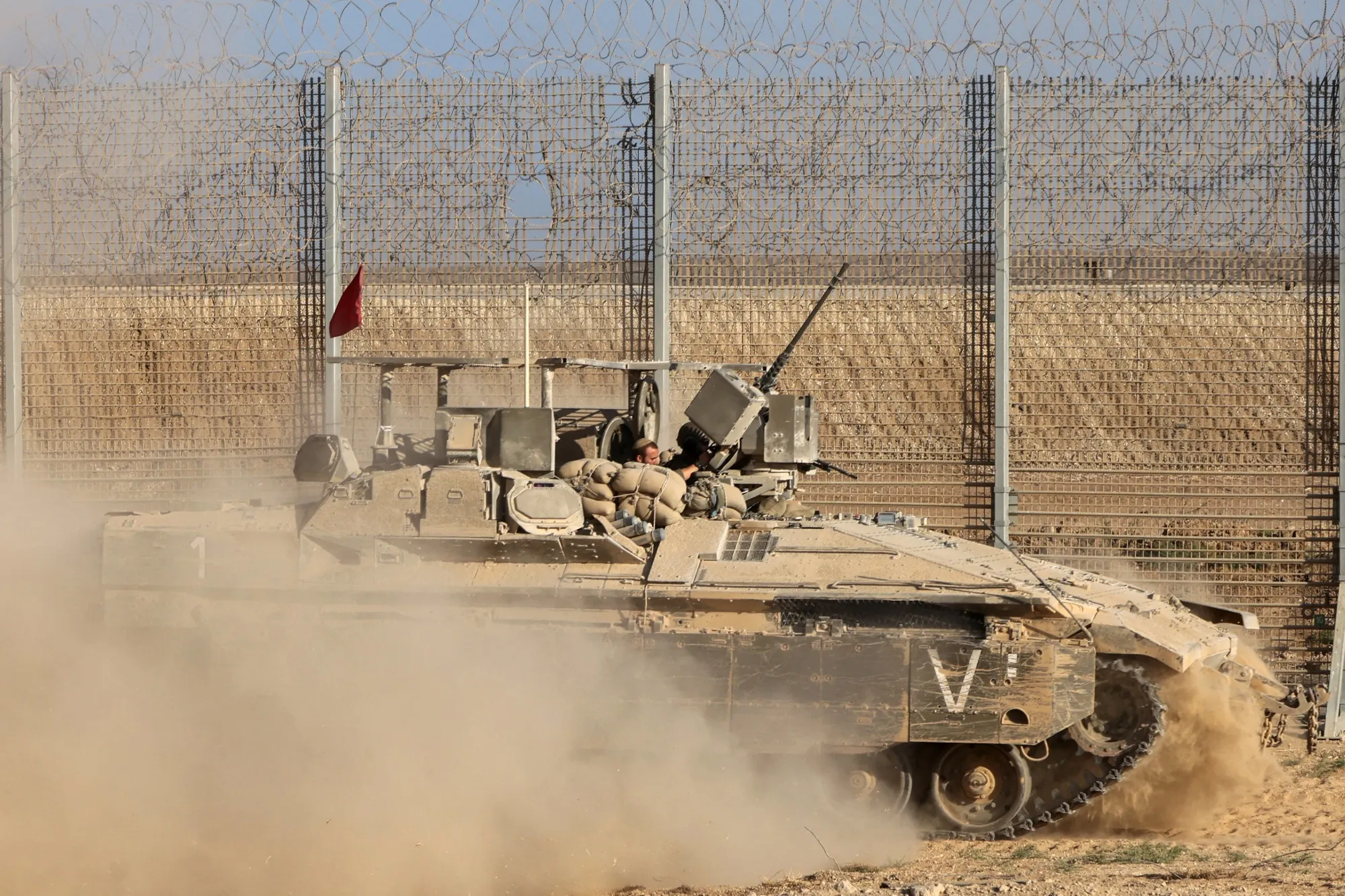 An Israeli military armored vehicle alongside the Gaza Strip border fence on Sept. 16, 2025.