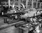 Assembling M-3 tanks in an American factory during World War II.