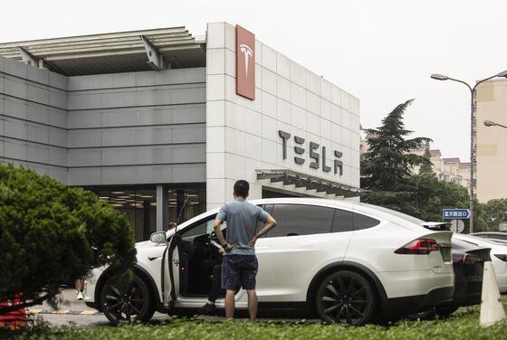 Tesla Takes Customers to Court to Silence Its Critics in China