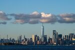 TOPSHOT - Clouds sit above the Manhattan skyline and Statue of Liberty on June 15, 2021 in New York City. (Photo by Angela Weiss / AFP) (Photo by ANGELA WEISS/AFP via Getty Images) Photographer: ANGELA WEISS/AFP
