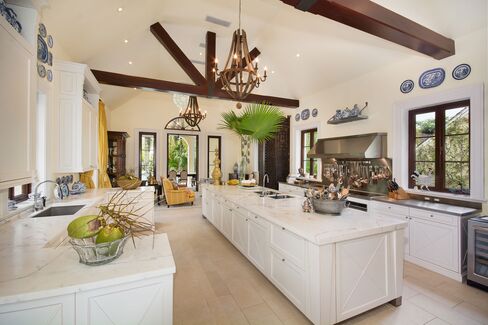 Original wood beams were preserved as the kitchen took on an airy feel following the estate’s multimillion-dollar makeover less than a decade ago.