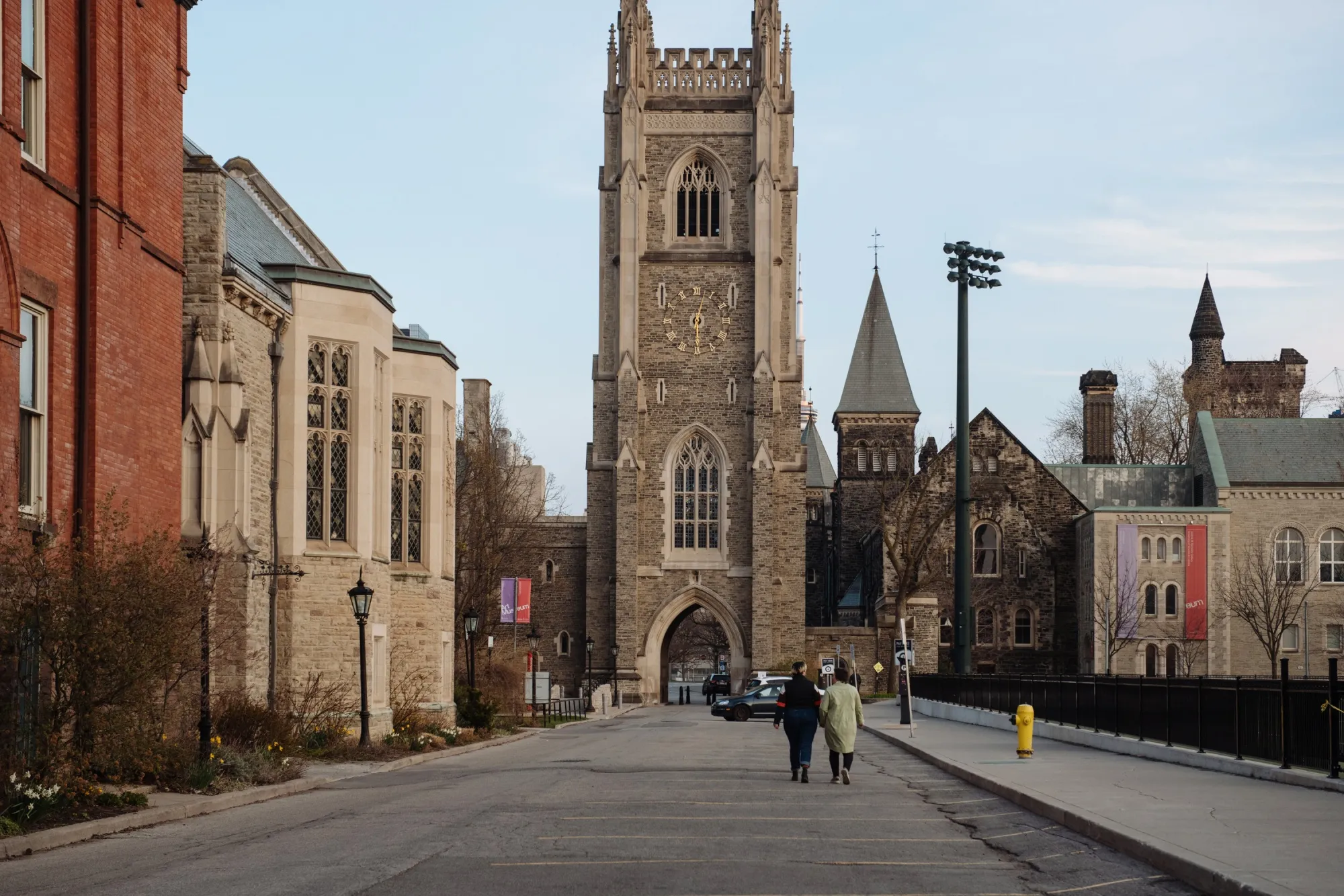Pedestrians walk through the University of Toronto campus in April.