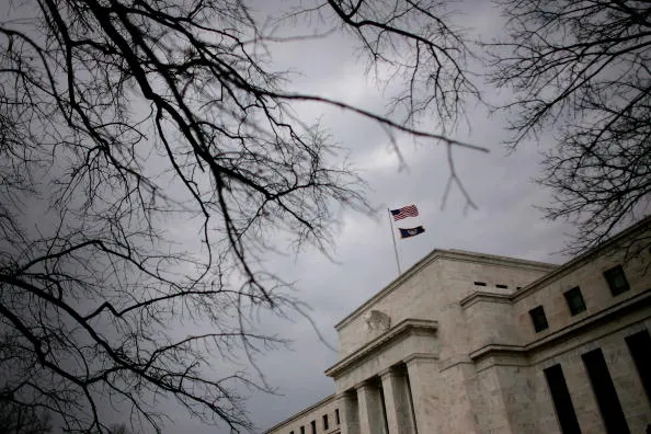 WASHINGTON - JANUARY 22: The Federal Reserve building is seen January 22, 2008 in Washington, DC. The Fed cut its benchmark interest rate by three-quarters of a percentage point after two days of tumult in international markets due to fear of a recession in the United States. (Photo by Chip Somodevilla/Getty Images)