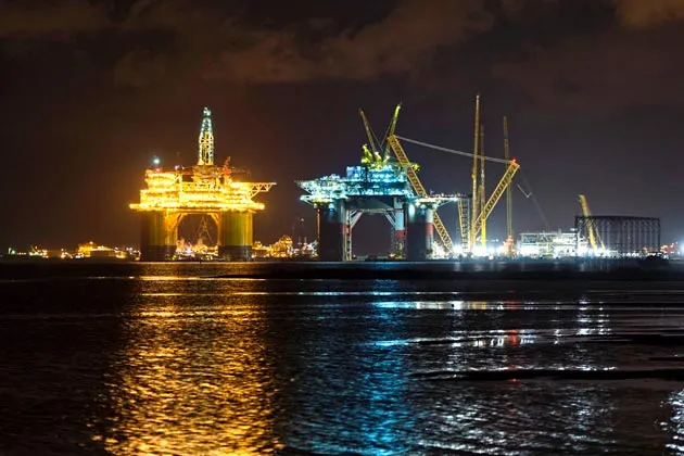 The Royal Dutch Shell Plc Olympus tension leg platform sets sail on its way to the Mars B Field in the Gulf of Mexico on July 13 