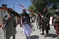Taliban fighters near Zanbaq Square in Kabul on Aug. 16.
