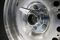 STRICTLY EMBARGOED UNTIL 0400 GMT ON THURSDAY NOVEMBER 17, 2016. The wheel sits on display during the unveiling of the body work on the Jaguar XKSS at the Jaguar Classic Workshop in Coventry, U.K., on Thursday, Sept. 8, 2016. SECOND SENTENCE HERE Photographer: Matthew Lloyd/Bloomberg