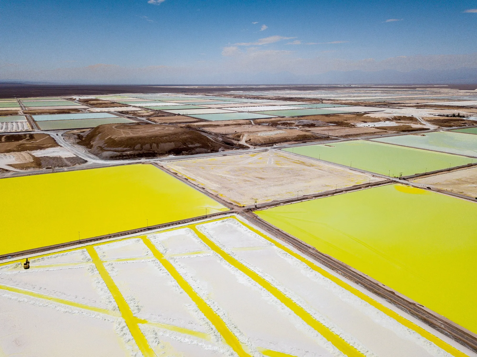 Brine pools at a Sociedad Quimica y Minera de Chile (SQM) lithium mine on the Atacama salt flat in Chile.