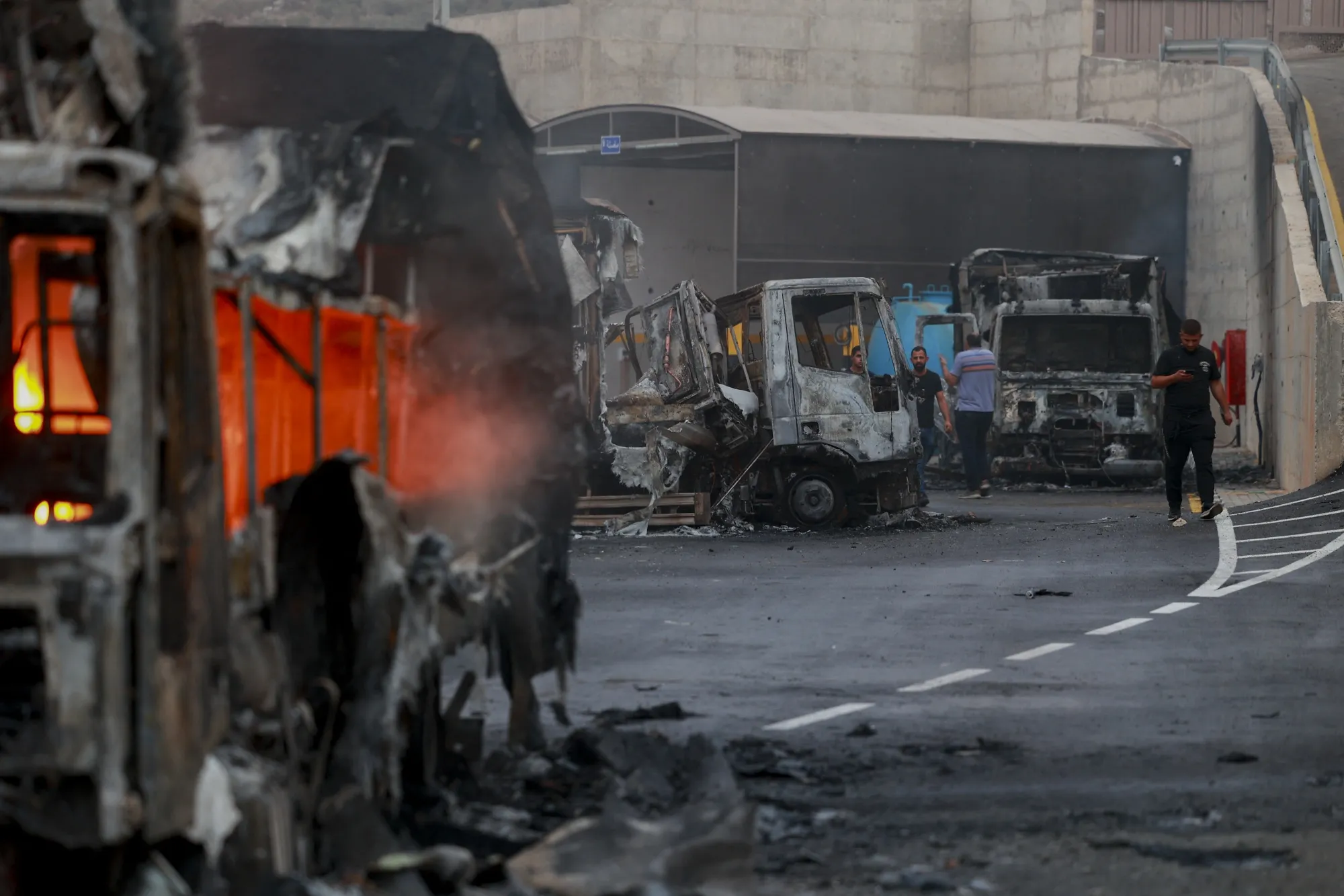 Burnt trucks after an attack by Israeli settlers in the village of Beit Lid, east of Tulkarm in the occupied West Bank, on Nov. 11.