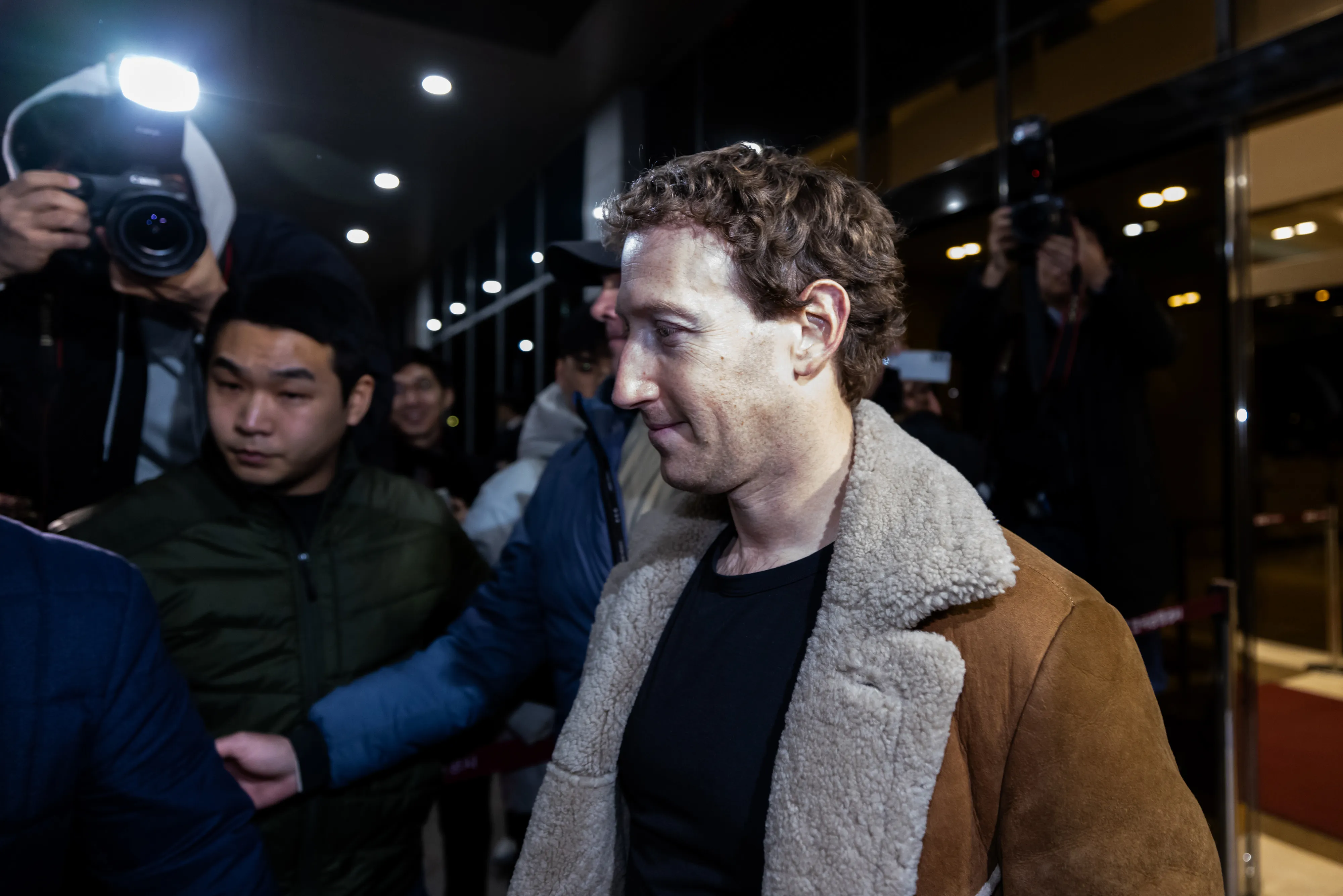 Meta CEO Mark Zuckerberg arrives at an airport in Seoul, South Korea, in February.