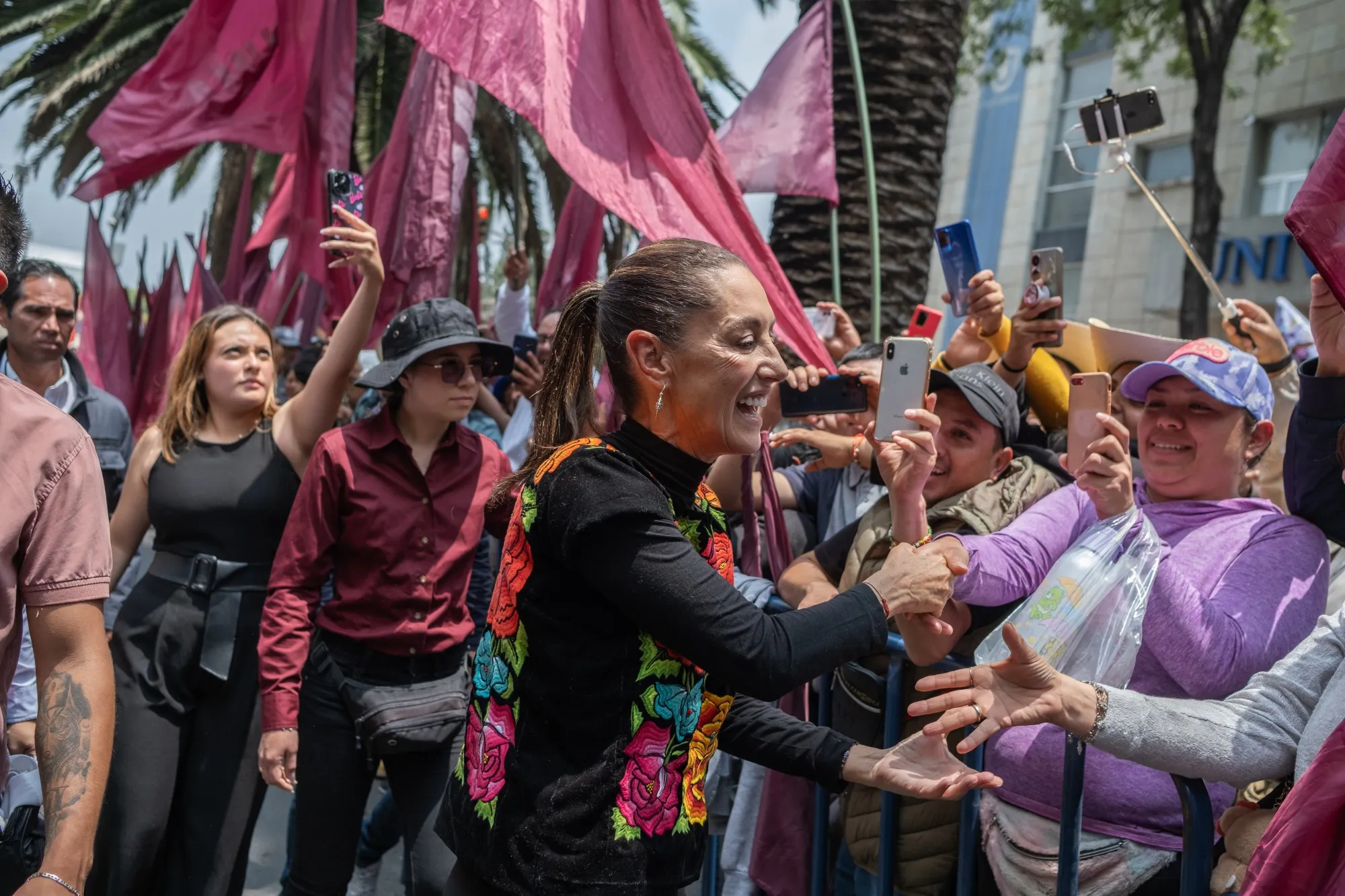 Claudia Sheinbaum greets supporters during a campaign rally in Mexico City, Mexico, on Aug. 26.
