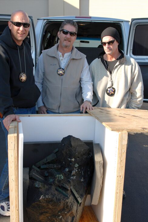 From left, Scott Miller, Mark Gayman, and now retired Lt. Tom Grub, of the L.A. Sheriffs Department, in 2008.