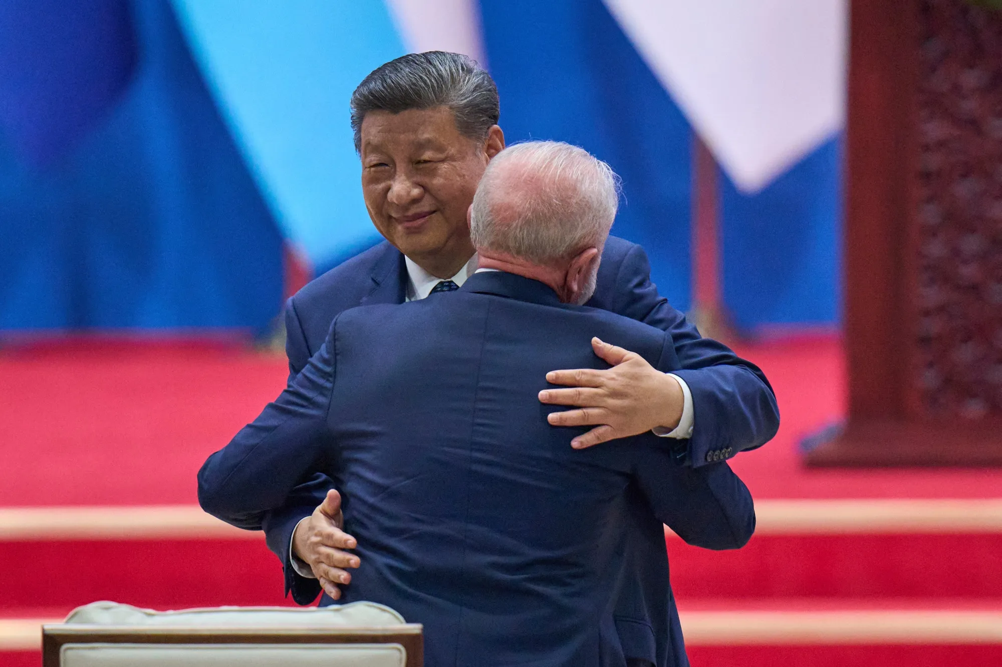 Chinese President Xi Jinping greets Brazil’s Luiz Inácio Lula da Silva after delivering his opening speech at the opening ceremony of the Fourth Ministerial Meeting of the Forum of China and Community of Latin American and Caribbean States in Beijing, on May 13.