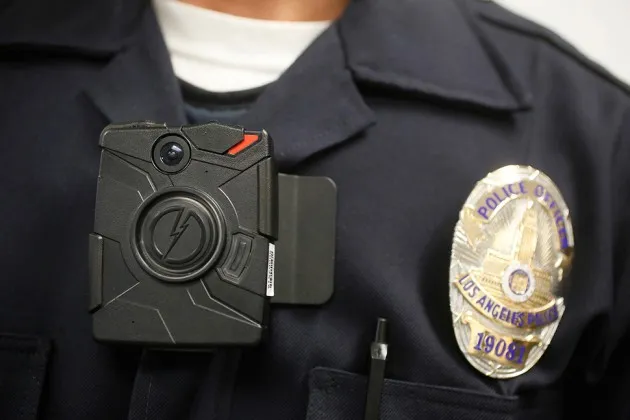 A police officer wears an on-body camera during a demonstration for the media in Los Angeles