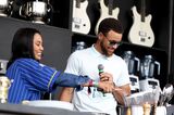 Ayesha Curry is joined by husband Golden State Warriors' Stephen Curry as she prepares a chicken and waffles recipe on stage during a cooking demonstration at the BottleRock Napa Valley music festival in Napa, Calif., on Friday, May 26, 2017. (Anda Chu/Ba