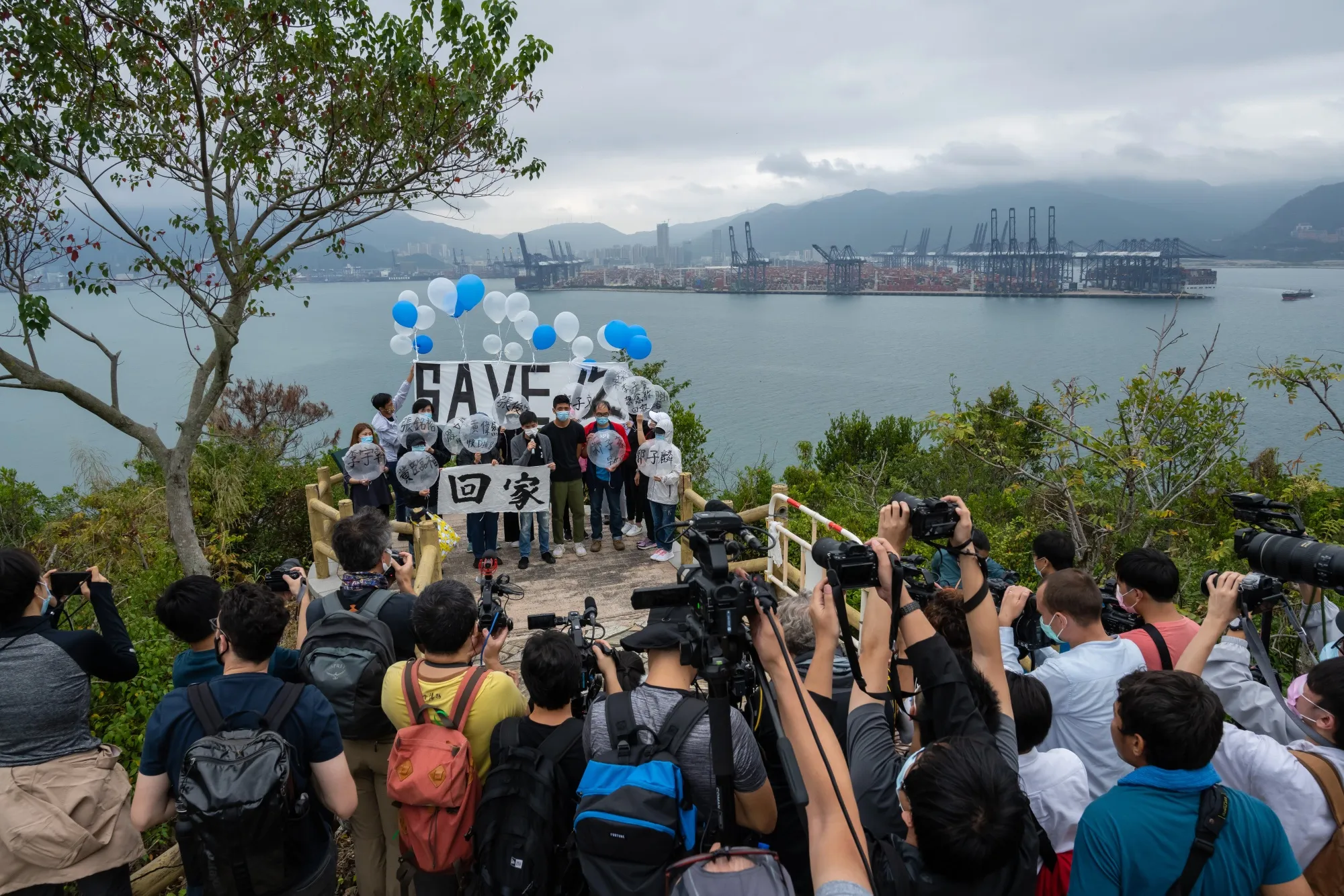 Supporters of 12 Hong Kong activists&nbsp;release balloons, marked with the names of the detainees, in Hong Kong, on Nov. 21.