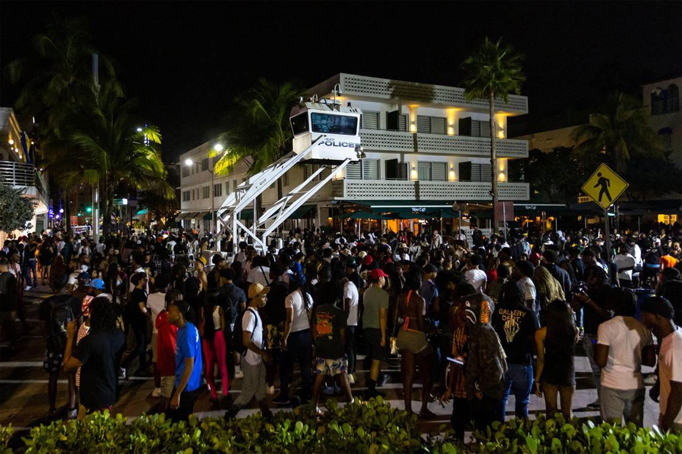 Crowds gather during spring break in Miami Beach, on Saturday, March 18.