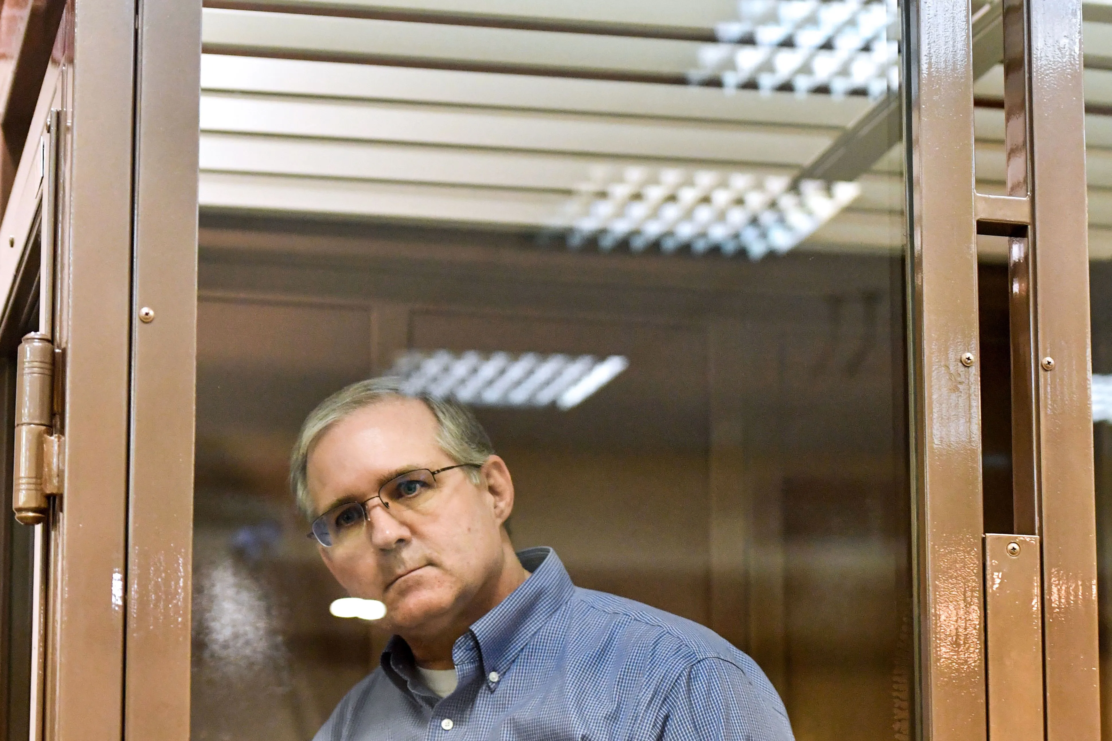 Paul Whelan&nbsp;inside a defendants' cage during a hearing in&nbsp;Moscow in 2019.
